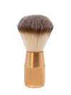 A photo of The Collective Rose Gold Shaving Brush standing upright.